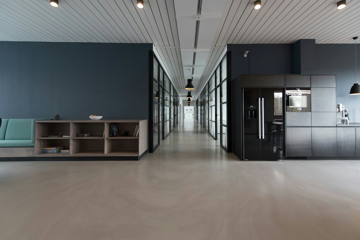 Modern office corridor with meeting rooms — office and workplace relocations in Christchurch